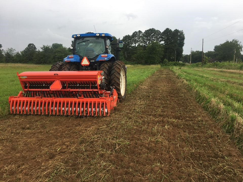 Tractor and tillage equipment tilling field