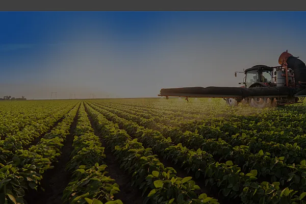 Farming equipment being used on crops