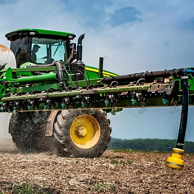 Tractor running over a field